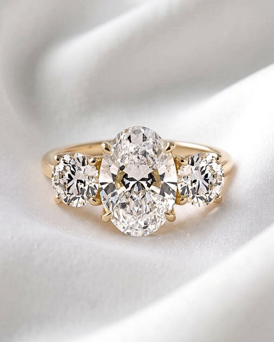 Iris - Oval Trilogy Round Setting Diamond Engagement Ring - Moissanite Engagement Rings