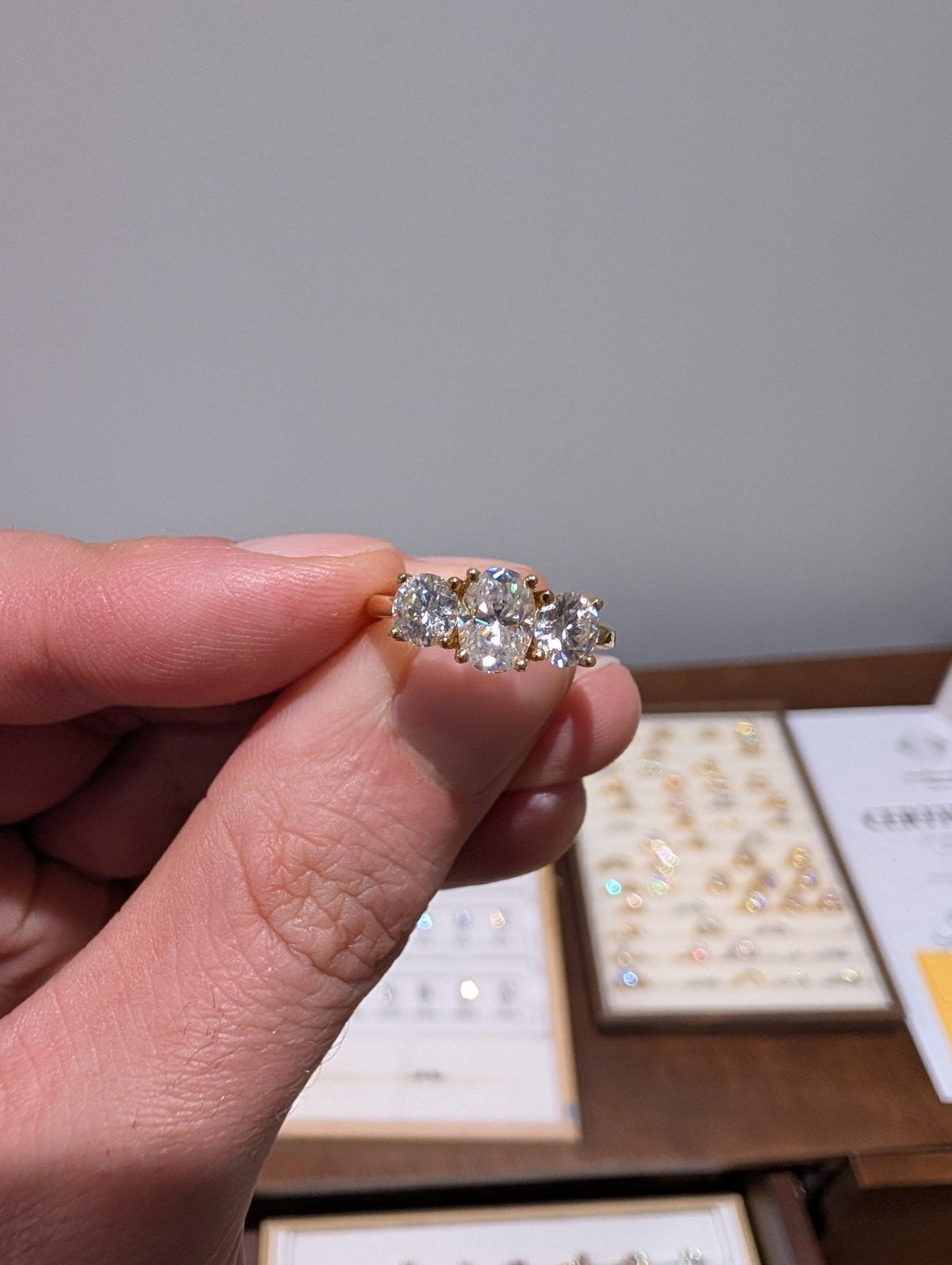 2ct Oval Trilogy Halo 18k Yellow Gold | Size J | 2mm band - Moissanite Engagement Rings